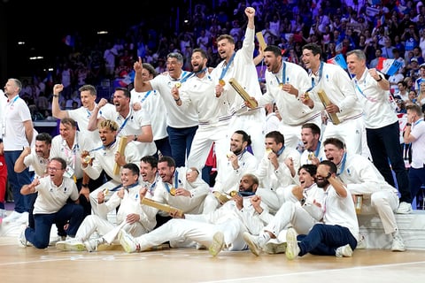 2024 Paris Olympics Men's volleyball: French team poses with their gold medals